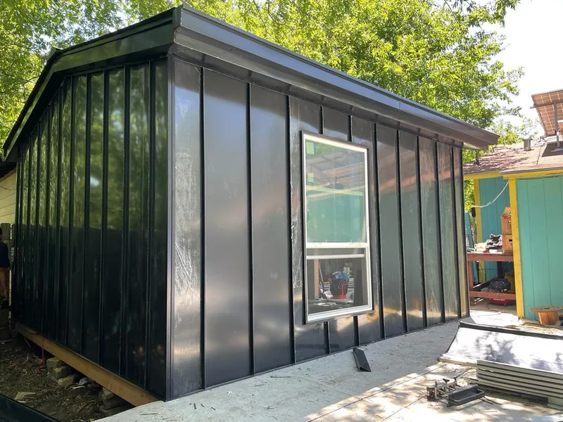 Black standing seam metal wall panels for Metal Roof Installation in Hurley