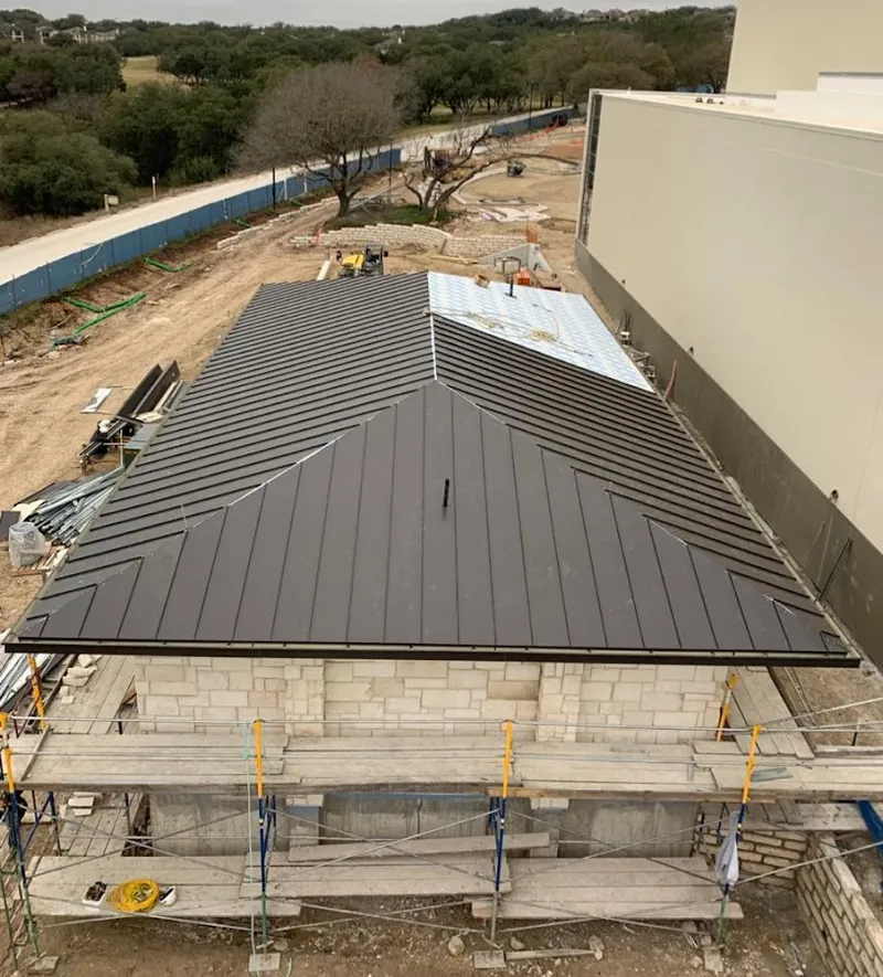Metal roof new construction with scaffolding in Hurley